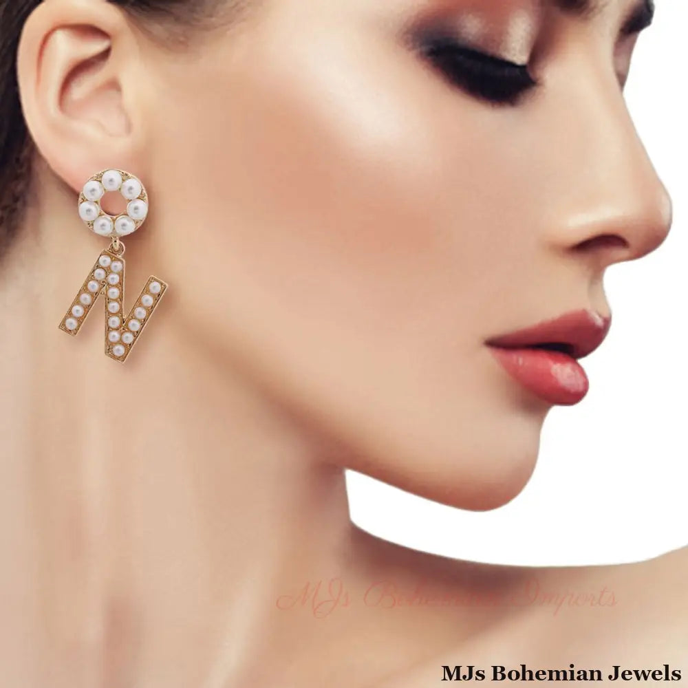 Creamy Comfort: Dangling N Earrings