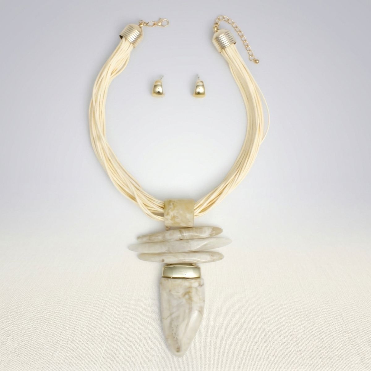 Ivory Marbled Horn Pendant Multi Cord Necklace