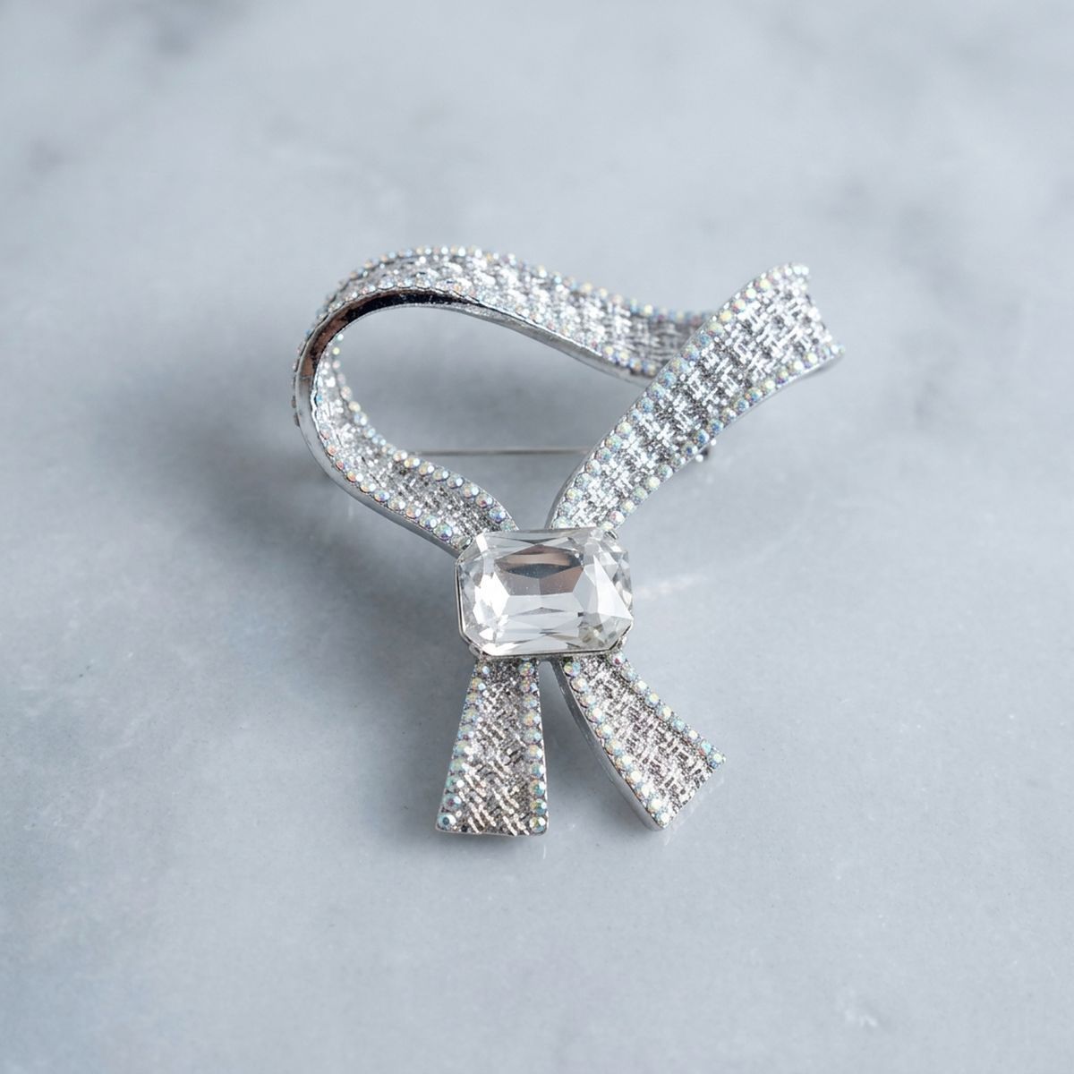 Silver and Clear Glass Crystal Woven Ribbon Brooch
