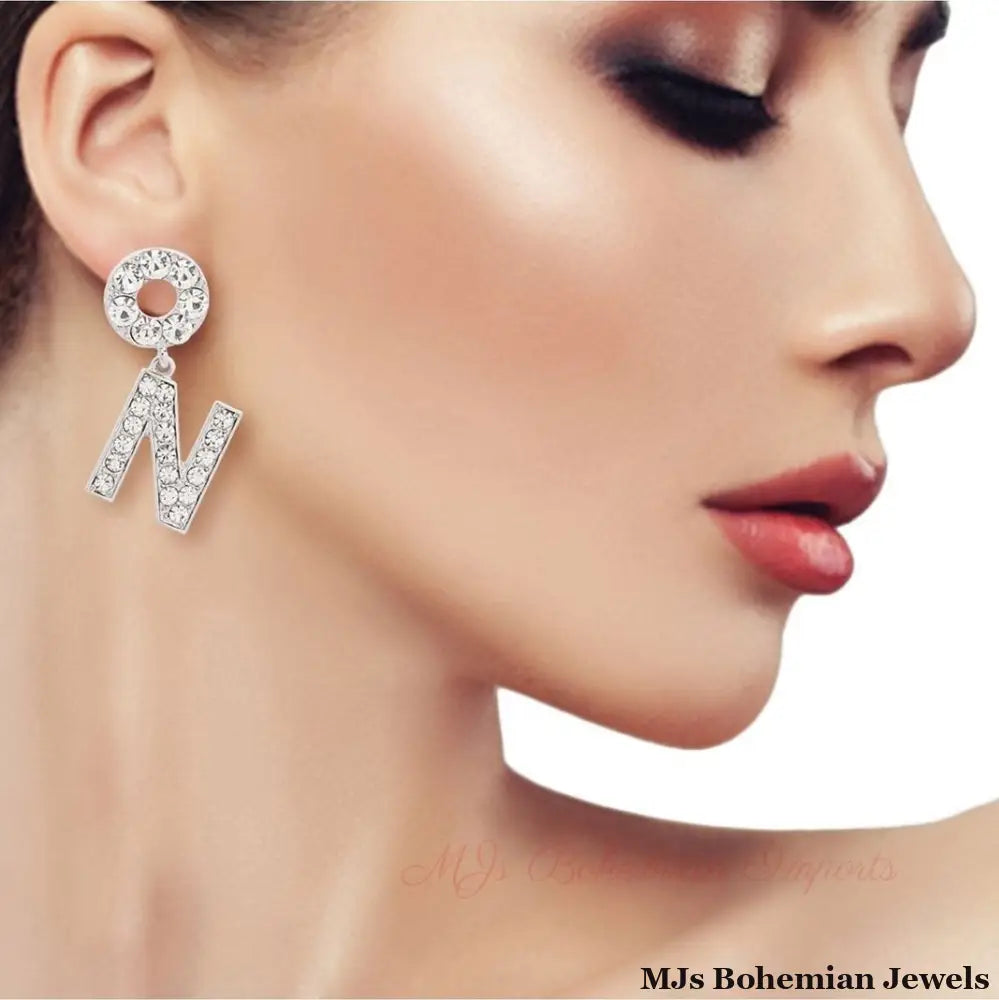 Silver Shimmer: Dangling N Earrings